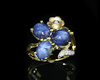 Blue star sapphire and diamond ring