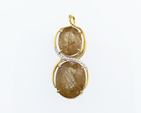 Rutile quartz and diamond pendant